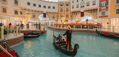 Immerse yourself in Venetian-inspired grandeur of the Villaggio Mall. Credit Qatar Tourism