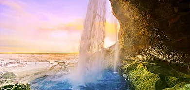 View of Seljalandsfoss waterfall at dawn in winter in Iceland
