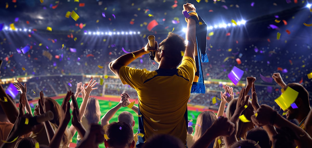 Fans cheering on the players and adding a zing to the atmosphere