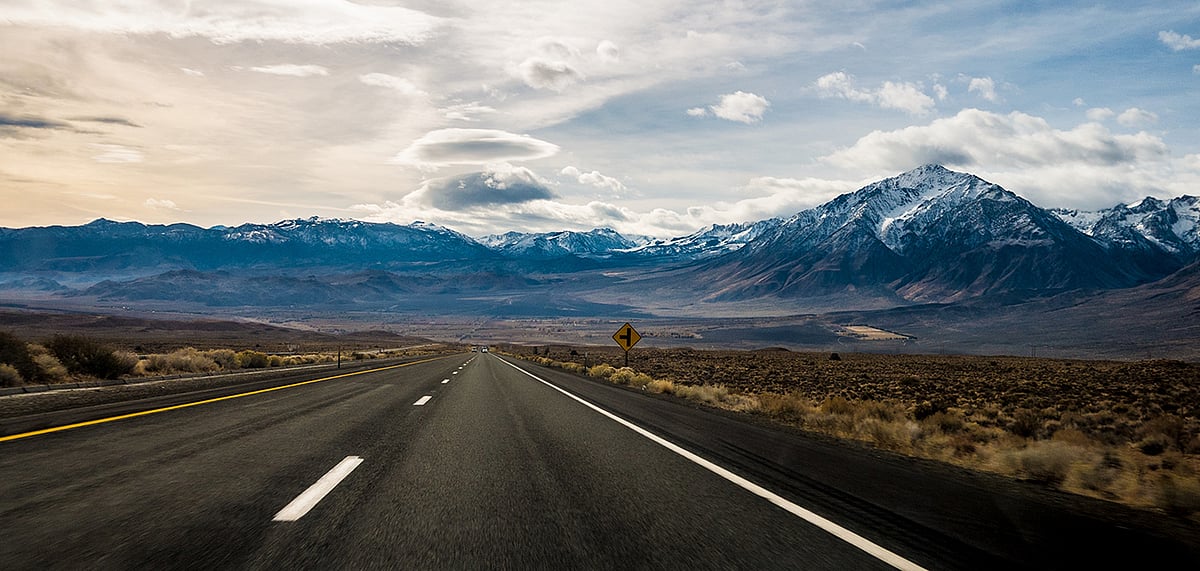 A road leading to the mountains