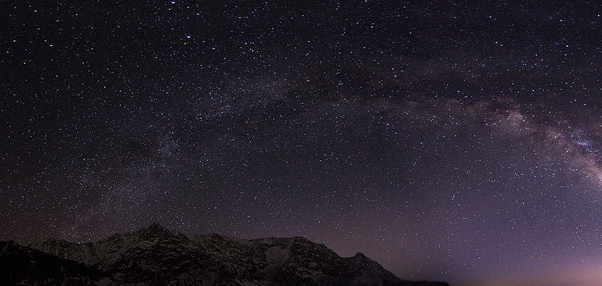  Sky covered with stars above the ice capped mountains