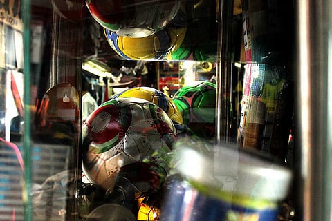 Footballs on display at the market make a perfect souvenir