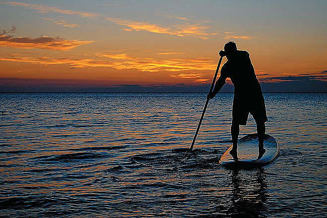 Stand-up paddle boarding at Chilika Lake
