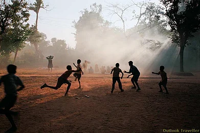 Several old bungalows in the Anglo-Indian settlement of McCluskieganj are now hostels for school kids. Here children play on the grounds of St Jones Bungalow after school hours