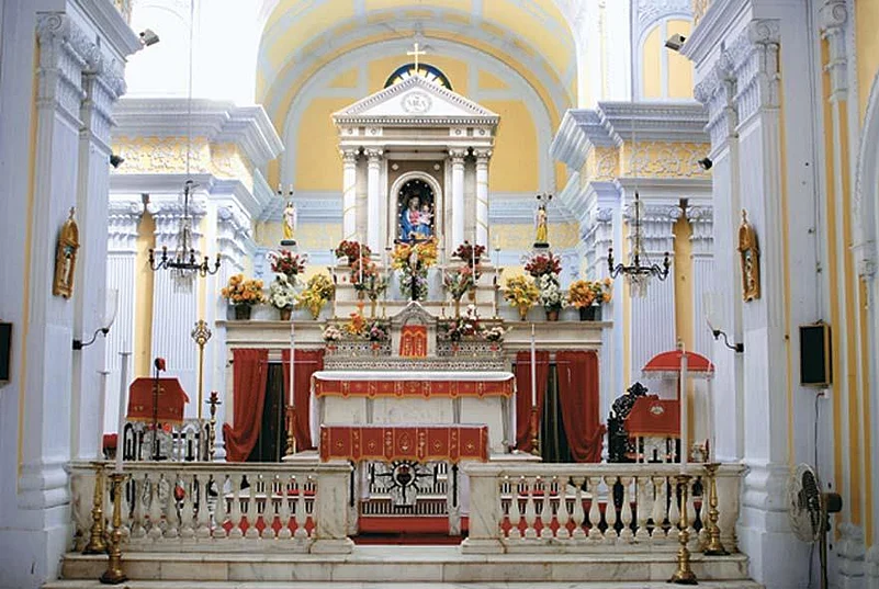 The bright and colourful altar at the Sardhana Church