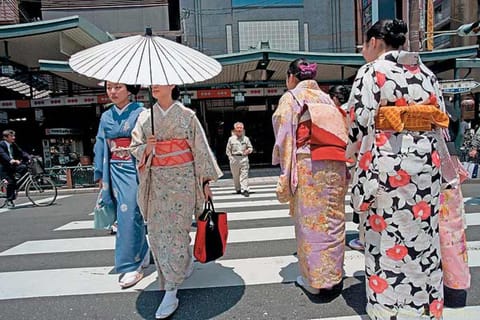 Japanese women dressed in their traditional dress Kimono