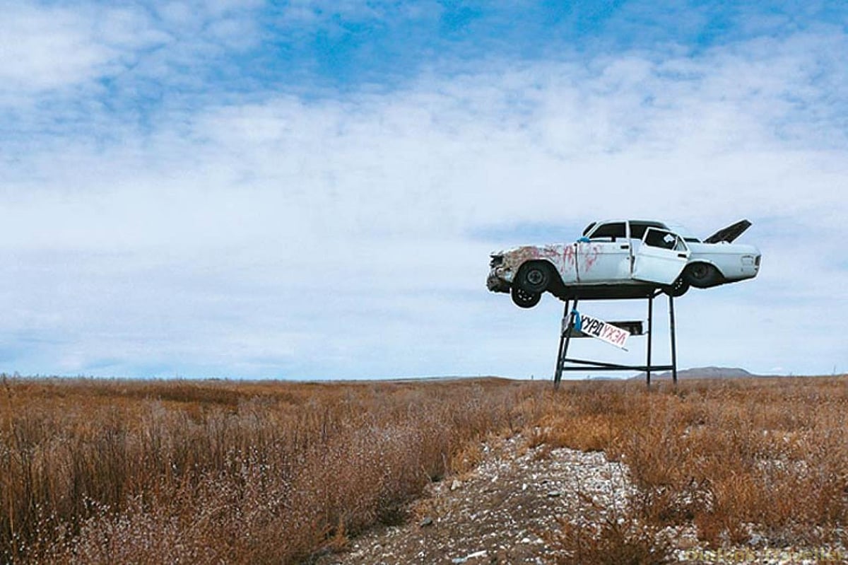 A sign on the new tar road in the Gobi desert thats being constructed -- it reads Speed Kills