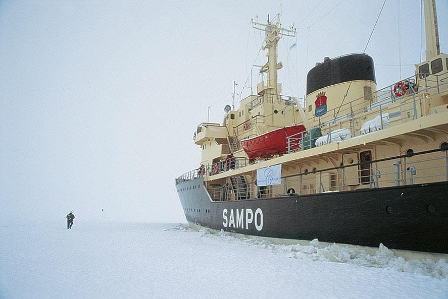 The icebreaker Sampo drops anchor in a frozen sea