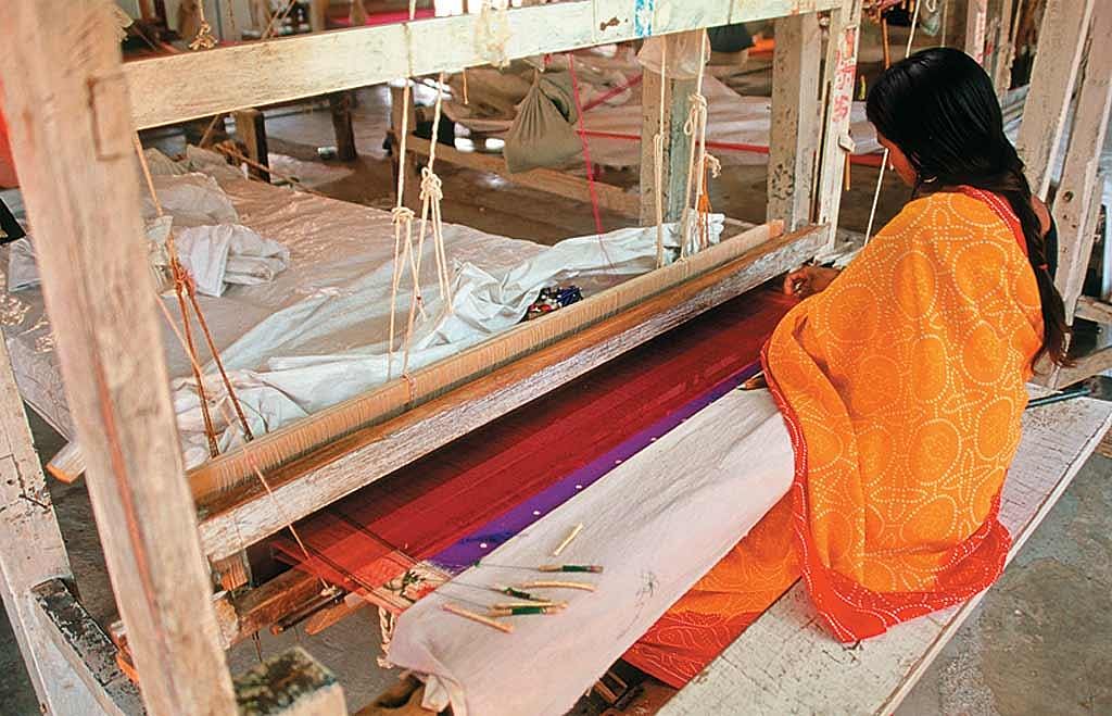 A sari weaver at work