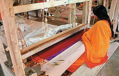A sari weaver at work