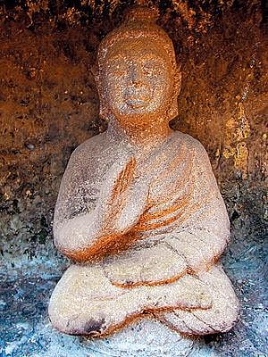 The main image of Buddha at the stupa in Sopara