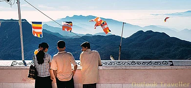 Depositphotos : Pilgrims taking a view of the summit