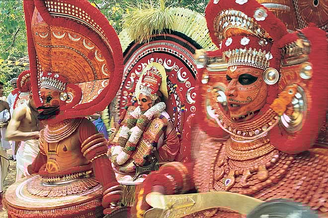 Dancers adorning Theyyam costume, Photo Credit Saibal Das