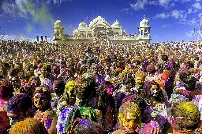 Massive gatherings come together to celebrate the festival of colours
