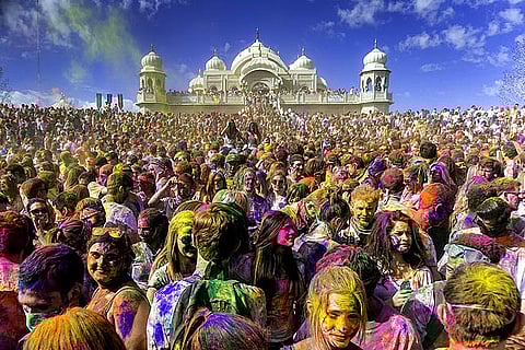 Massive gatherings come together to celebrate the festival of colours