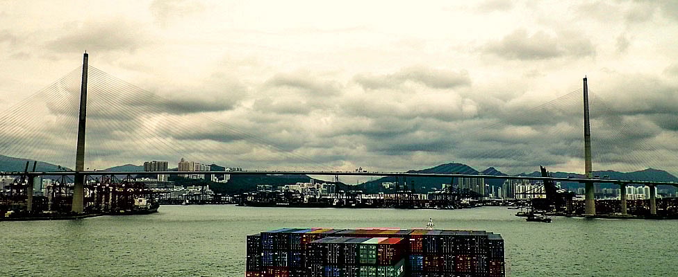 At the end of the journey on a container ship, in an overcast Hong Kong after days at sea