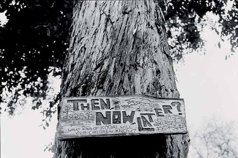 A sign posted at a school in Kodaikanal encourages visitors to think about changes in the ecology of the lake basin, and the problems caused by the growing number of tourists.
