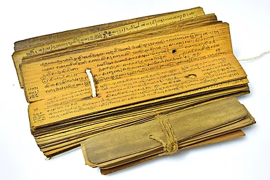 In earlier times, cured palm leaves were written on, to record events and administrative details. Credit www.shutterstock.com / AjayTvm