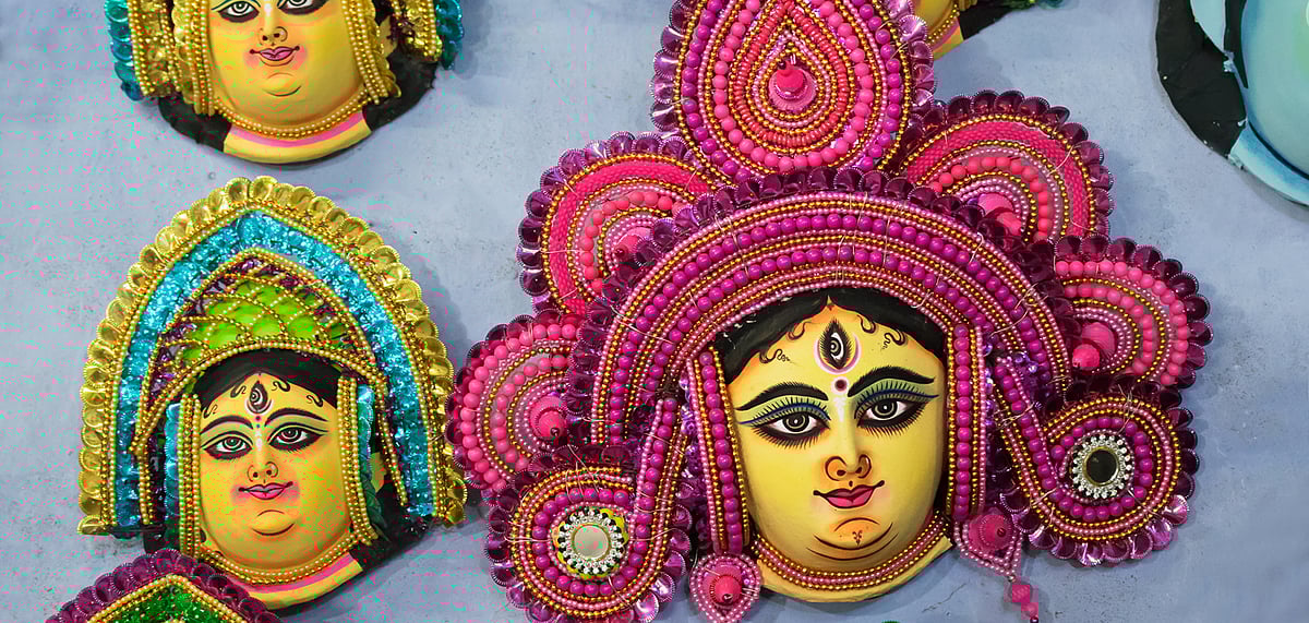 Shutterstock : Colourful Chau masks on display