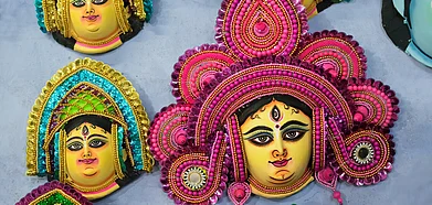 Shutterstock : Colourful Chau masks on display