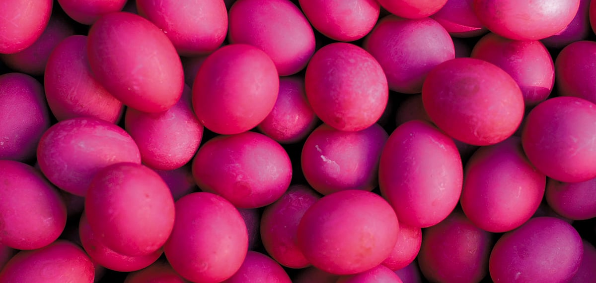 Try itlog na pula which is salted duck boiled in pink water