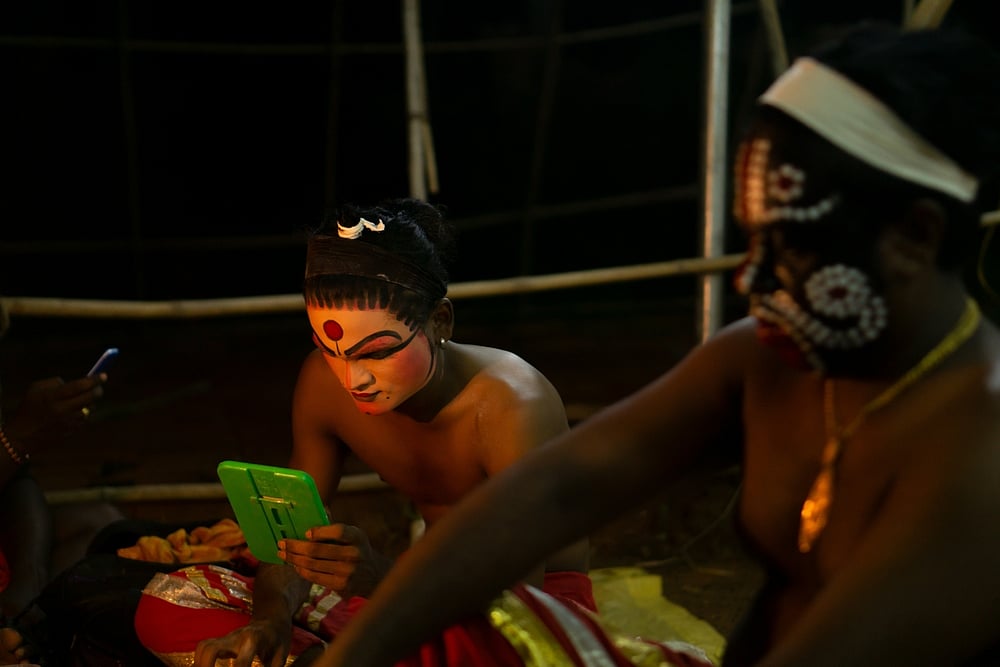 Performers getting ready for Bhuta Kola. Sampath Nayak / Shutterstock.com
