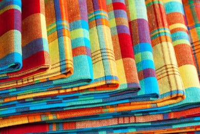 Stacked madras tablecloths. Photo Credit Shutterstock