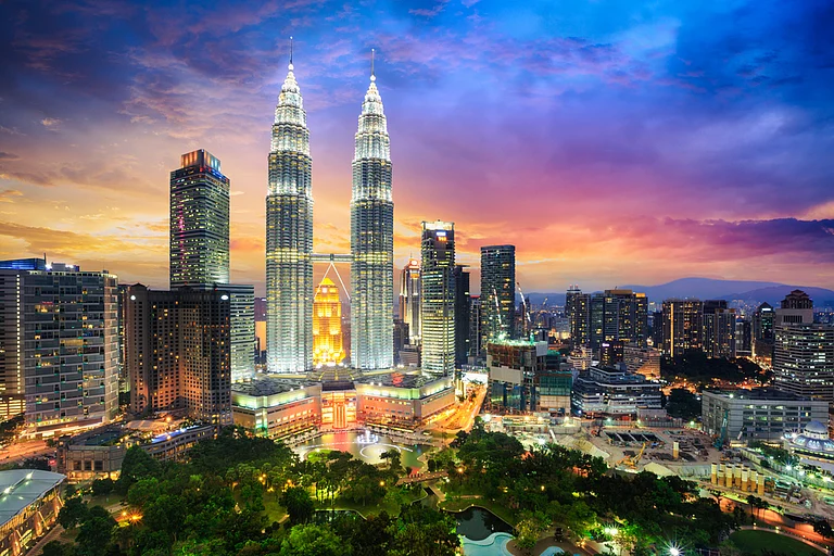 The Kuala Lumpur skyline at dusk - Shutterstock
