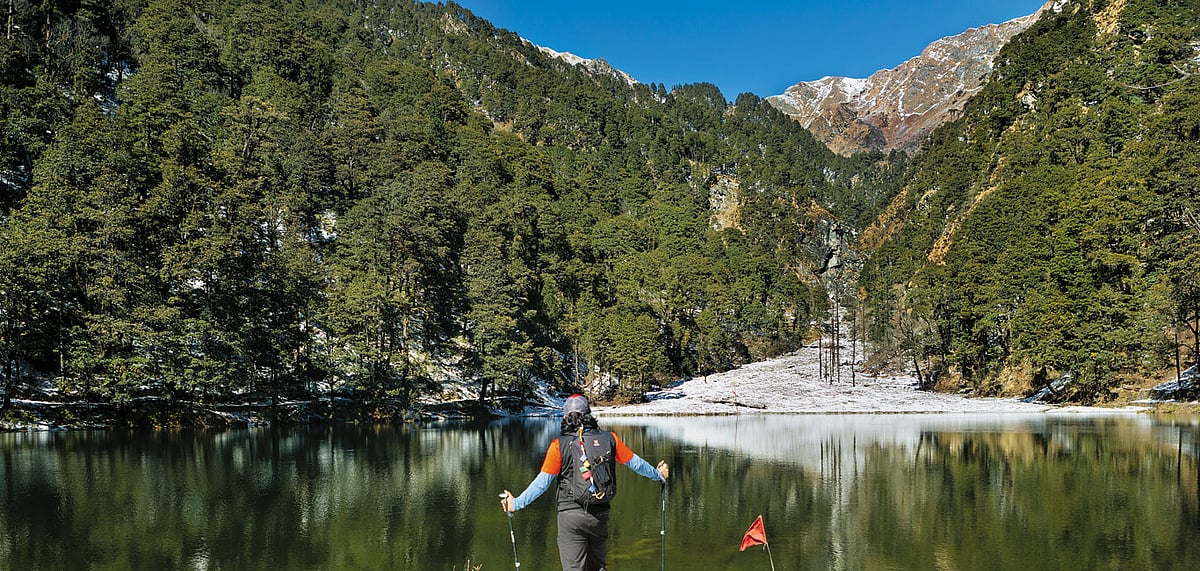 Catching our breath at Dodital Lake, nestled amid mountains at an altitude of 3,130 m