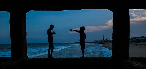 Sunset scene on the Bay of Bengal on Goubert Avenue in Pondicherry