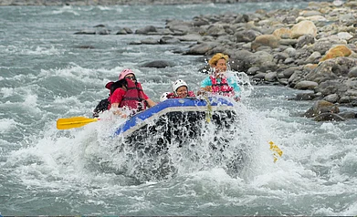 Its not just about the thrill of rafting. The descent along the Bornadi river offers spectacular views on both sides with a perfect backdrop of blue hills. Photo credit Surajit Sharma.jpg