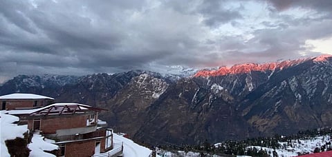 The sun touches the zenith of the Nanda Devi mountains