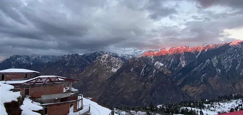 The sun touches the zenith of the Nanda Devi mountains