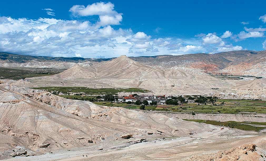 Strategically positioned on the trade route, the city of Lo Manthang became so wealthy that it needed to secure itself behind a 26ft-high wall punctuated by a series of 14 watchtowers. A single gate allowed access to the 180 houses within, which till a fe