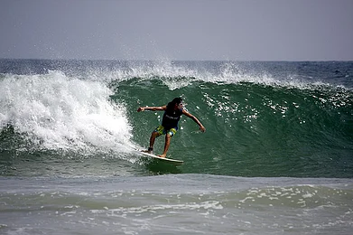 Go on a surfing holiday to Kovalam, Kerala