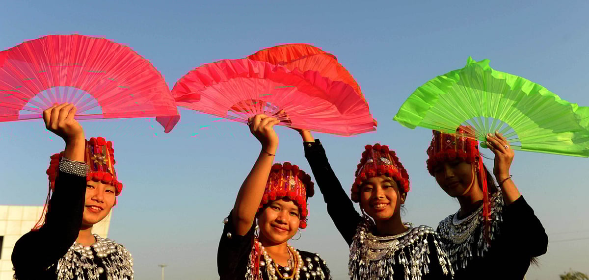 Singpho girls dressed in traditional attire for a dance performance in Namsai 