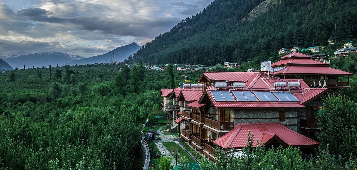 ShivAdya Resort & Spa in Manali sits snug between lush apple orchards and snow-covered mountains