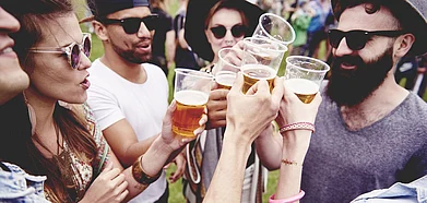 A group of friends indulge in beer