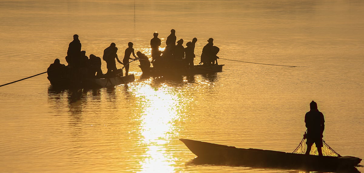 Sweet water fishing activity at lake Dalpat Sagar in Jagdalpur, Bastar, Chhattisgarh
