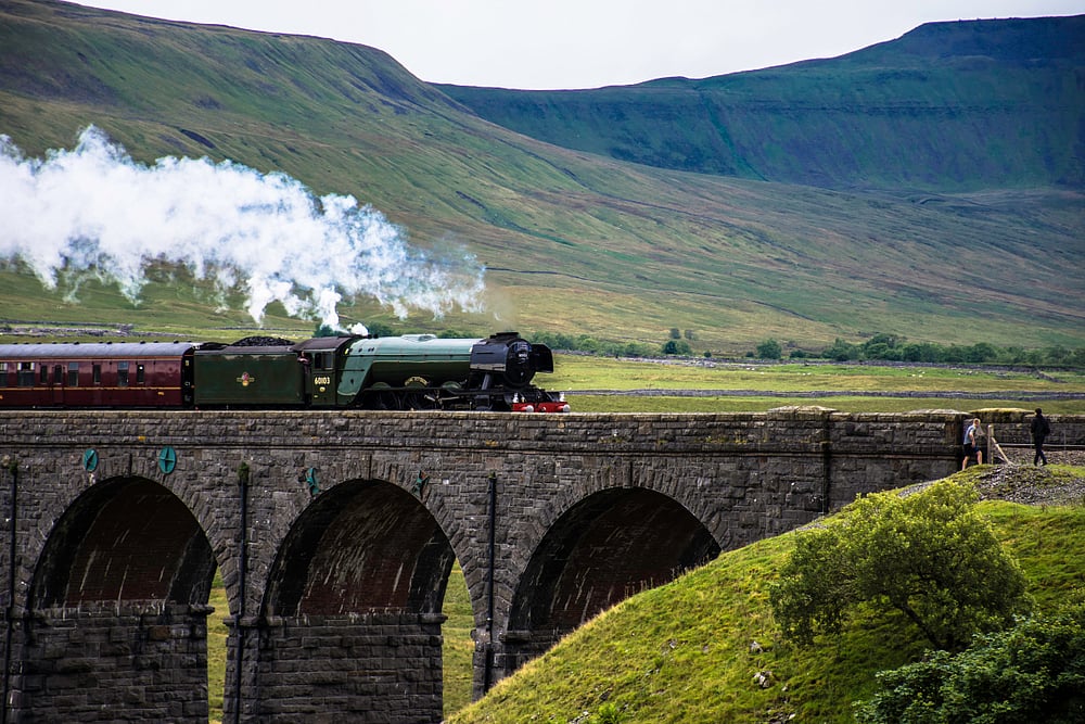 The Flying Scotsman runs across the Ribble Head viaduct in the Yorkshire Dales        Photo credit Karl Weller / Shutterstock