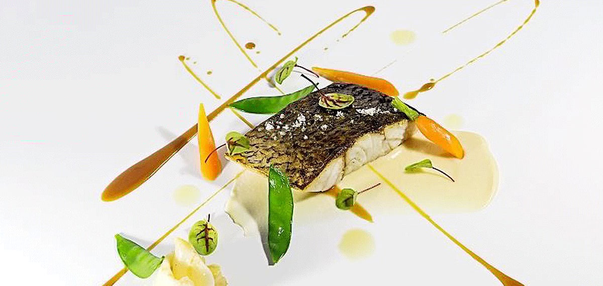 Tuck into a plate of grilled seabass at the Spanish food festival