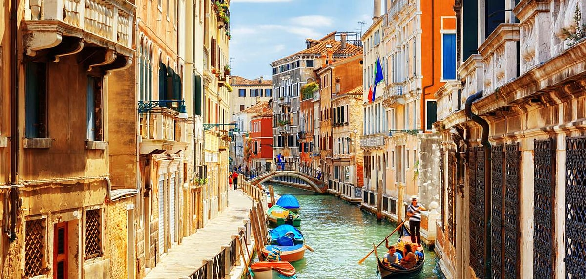 View of the Rio Marin Canal with boats and gondolas  