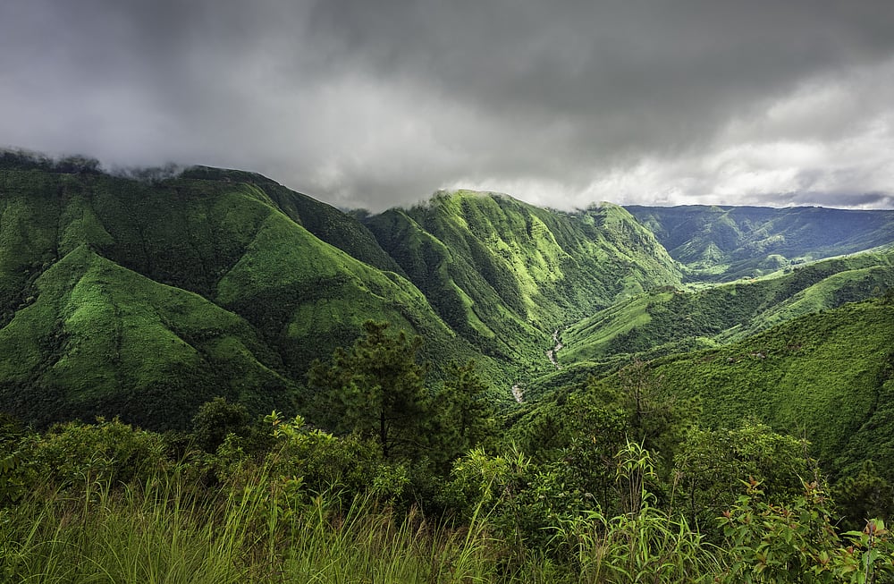 Storm clouds gather over the Khasi Hills, over the deep valley gorges near Cherrapunjee, Meghalaya