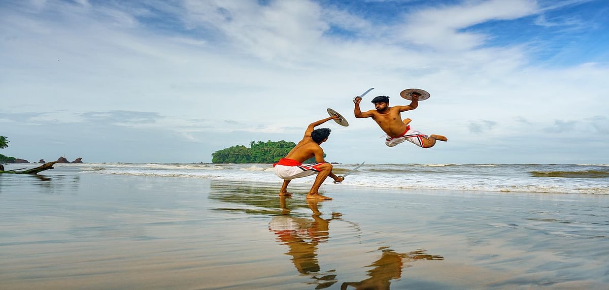 Artists performing Kalaripayattu, Keralas traditional martial art form 