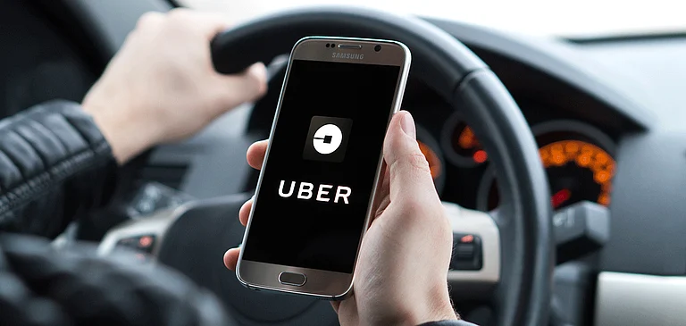 Uber ties up with DMRC to launch public transport services - null