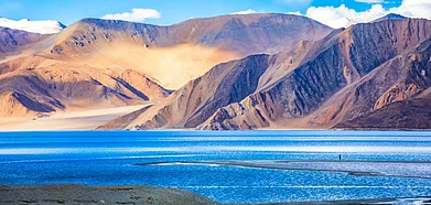 Must-visit destinations in the region include the ethereal Pangong Tso lake