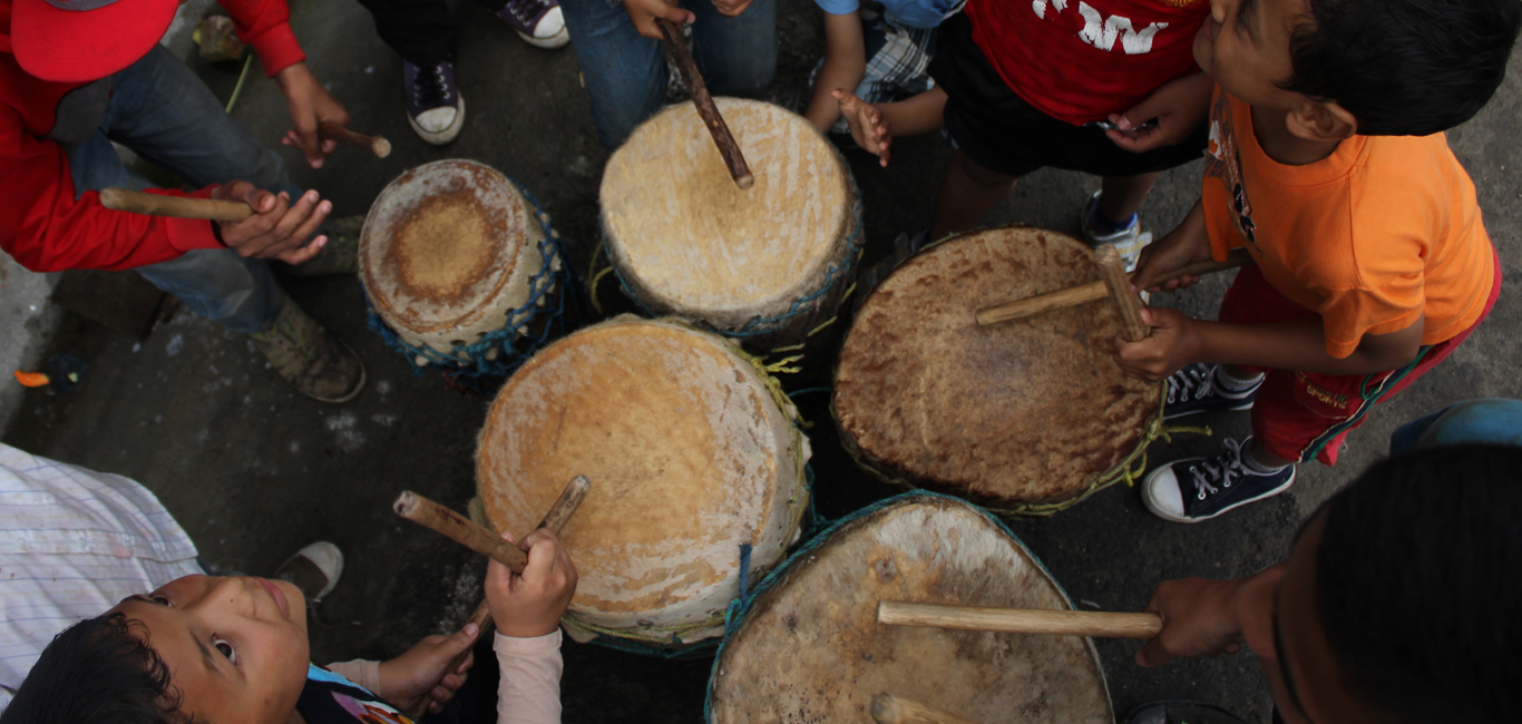 Young boys beat traditional skin drums during the Behdeinkhlam festival at Jowai in Jaintia Hills