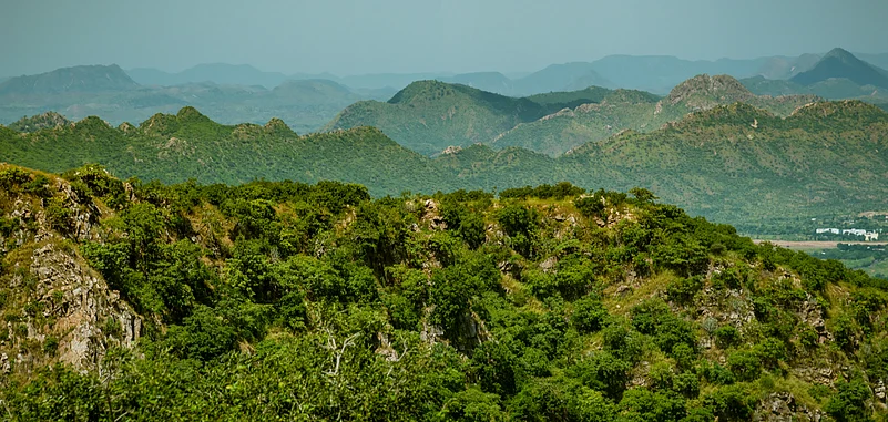 The Aravalli hills start near Delhi, pass through southern Haryana and Rajasthan, and end in Gujarat