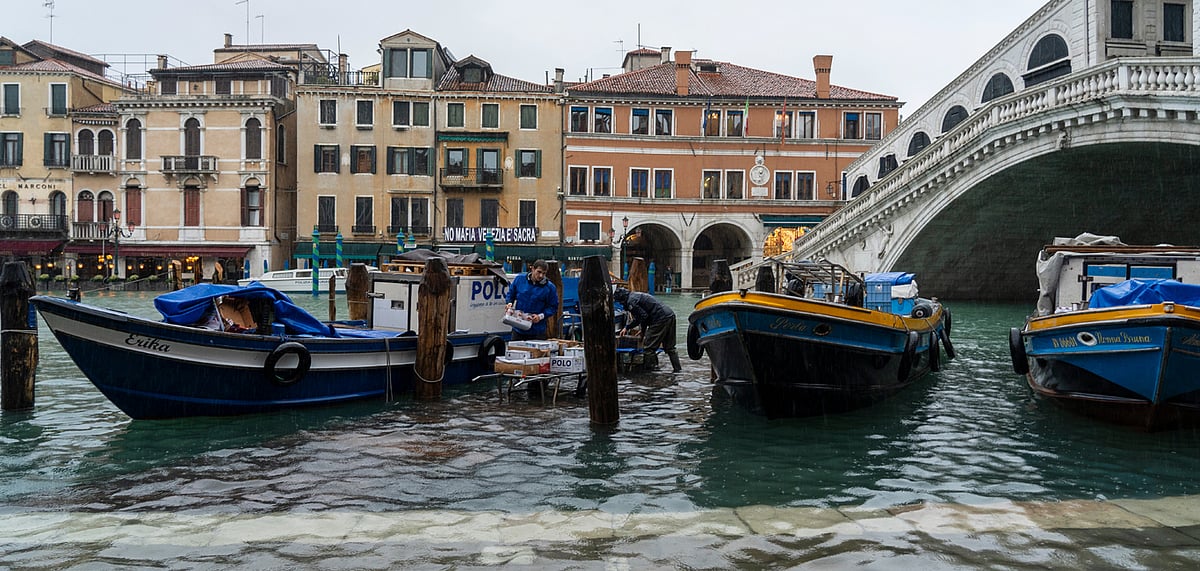 Rialto bridge during flood (acqua alta) in Venice, Italy