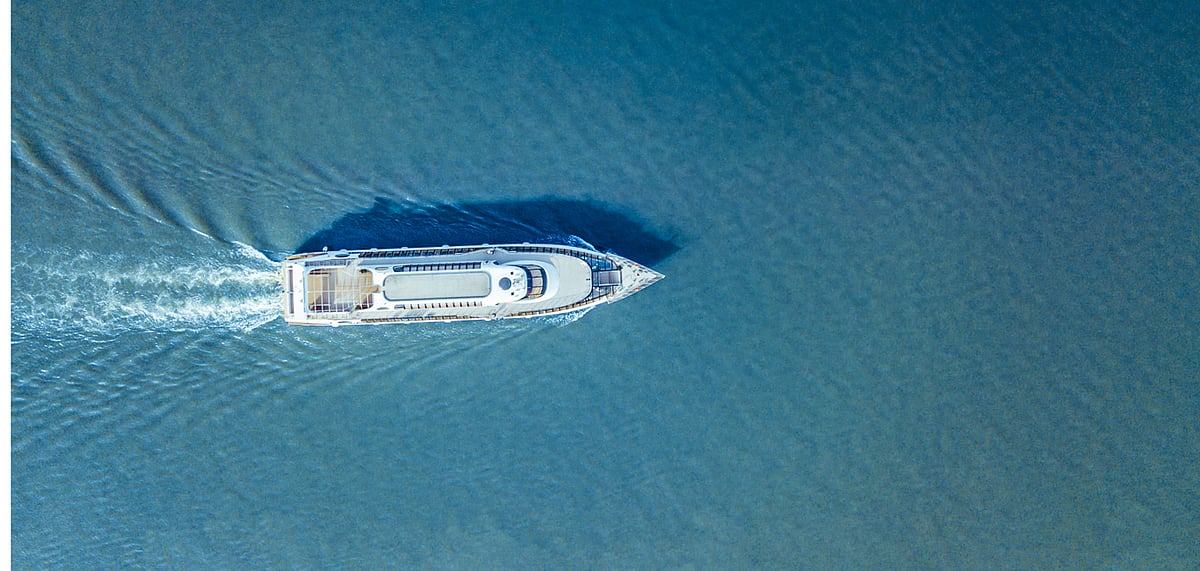 A ferry in the sea on a sunny day (disclaimer not the actual ferry) 